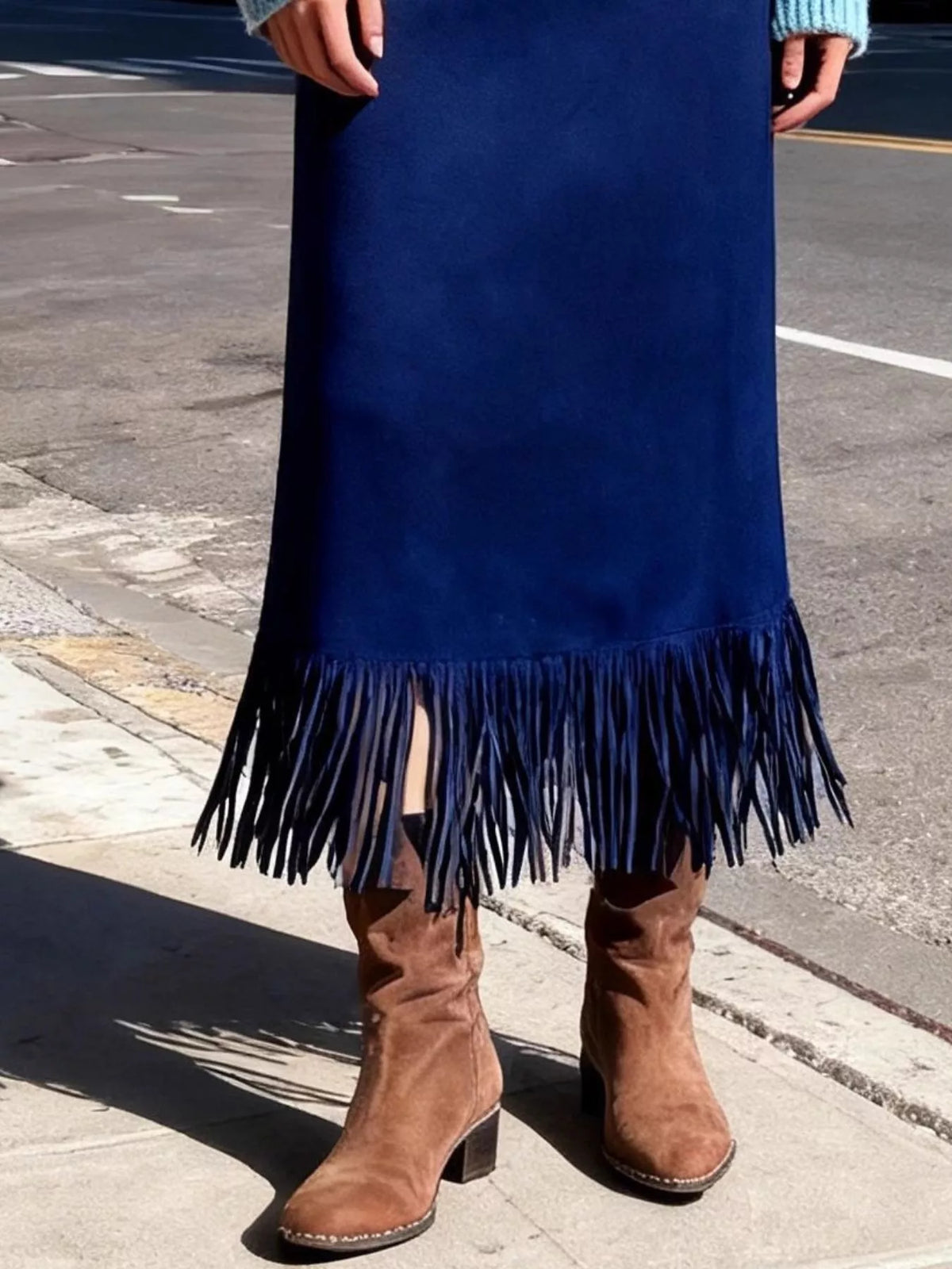High-waisted suede midi skirt, dark blue suede with fringe hem detail