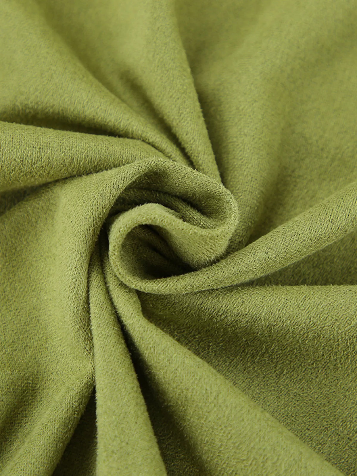 Matcha green midi skirt fabric close-up showing a soft, fine texture.