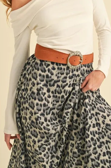 Aemi+Co leopard midi skirt close-up showing the waist and flowing fabric