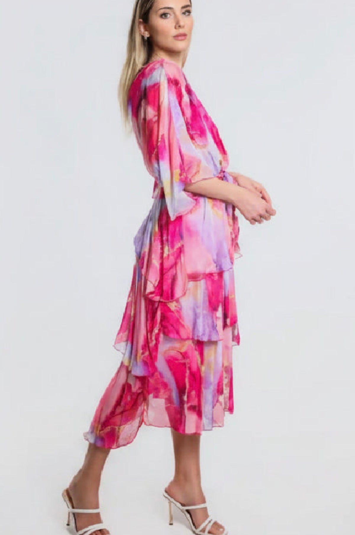 Ruffled silk dress with pink floral print, V-neck, tiered midi skirt, sheer sleeves