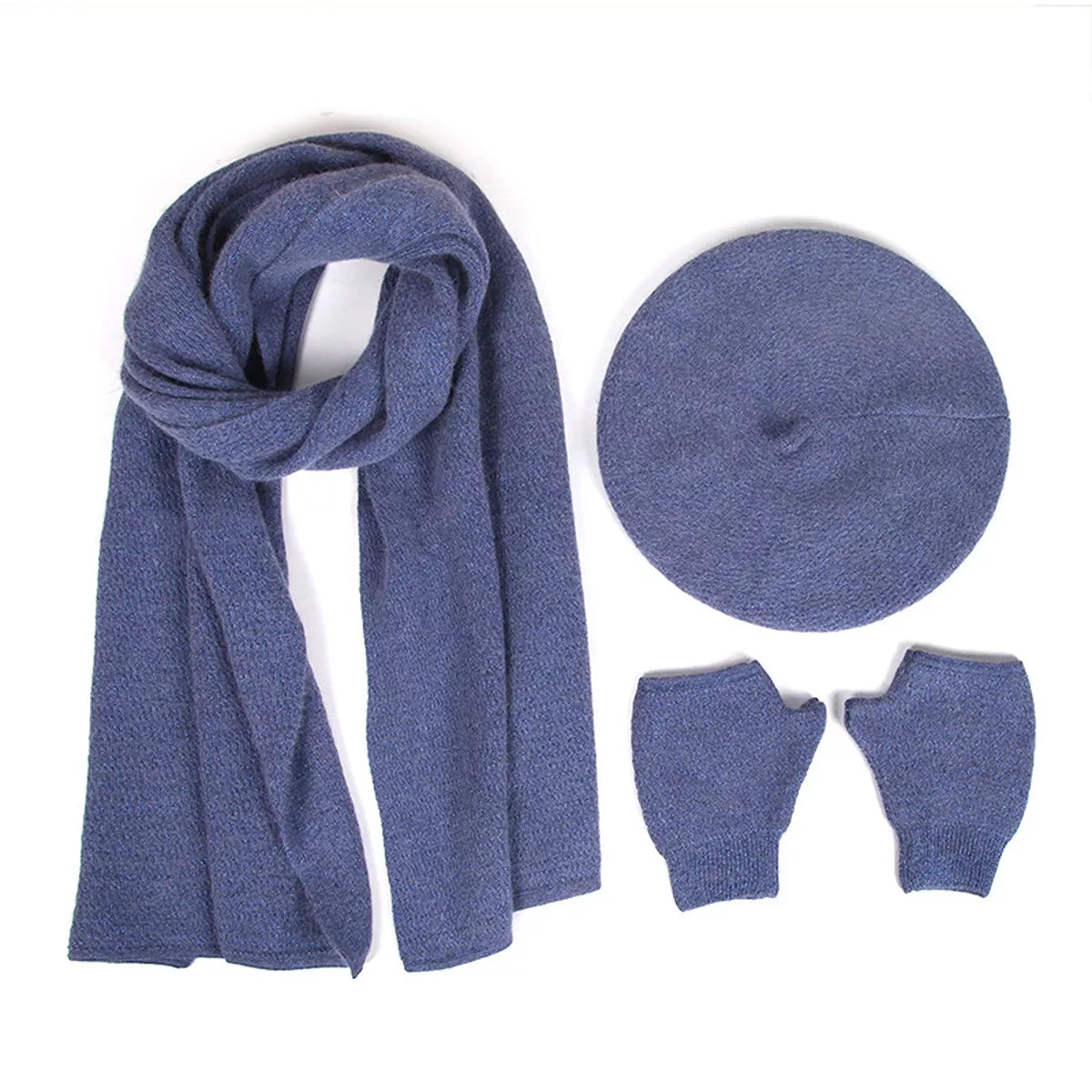 Blue knitted winter set arranged flat with long scarf, beret, and fingerless gloves