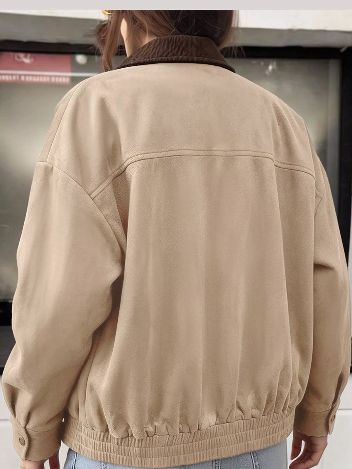 Apricot/beige zip-up dropped shoulder jacket back view with ribbed hem and cuffs