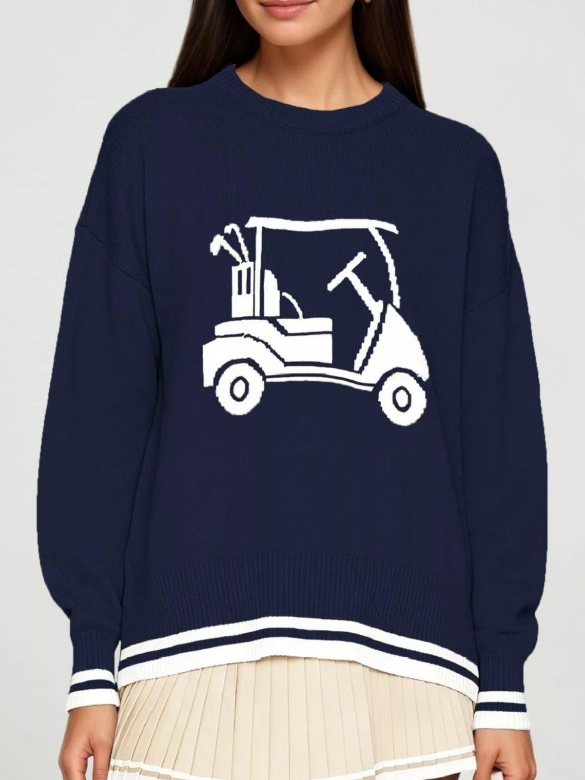 Navy golf cart graphic sweater with crew neck, ribbed cuffs, and white striped hem