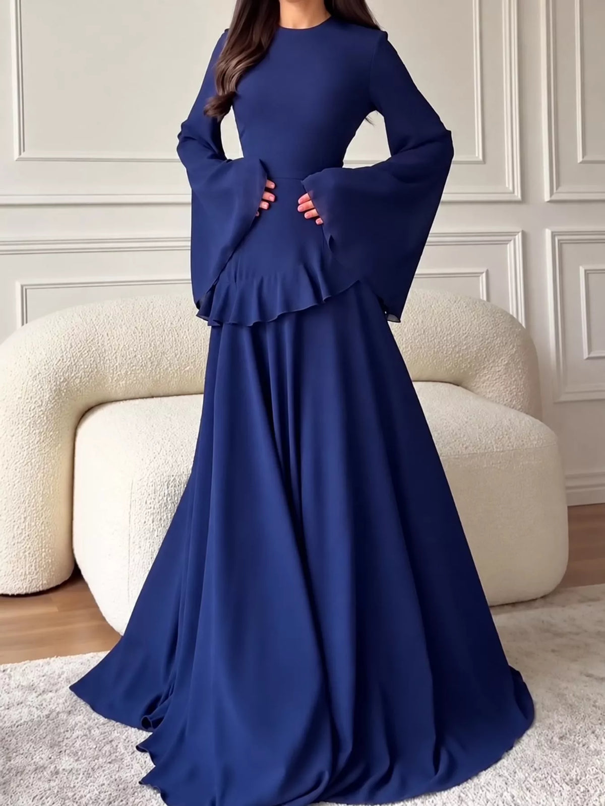Dark blue plus-size maxi dress with ruffled flare sleeves and tiered skirt
