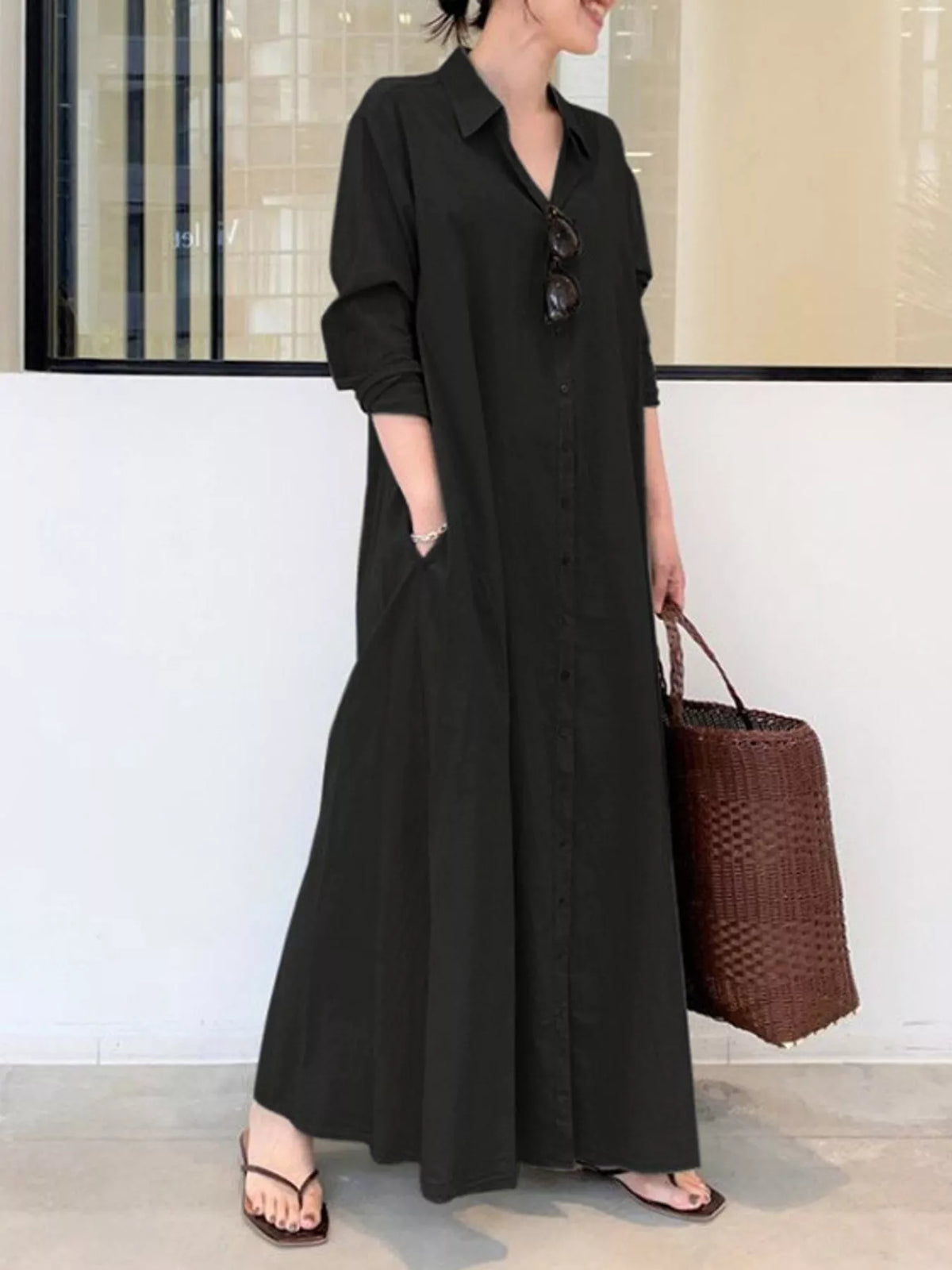 Black button-front long sleeve maxi shirt dress with V-neck and side pockets