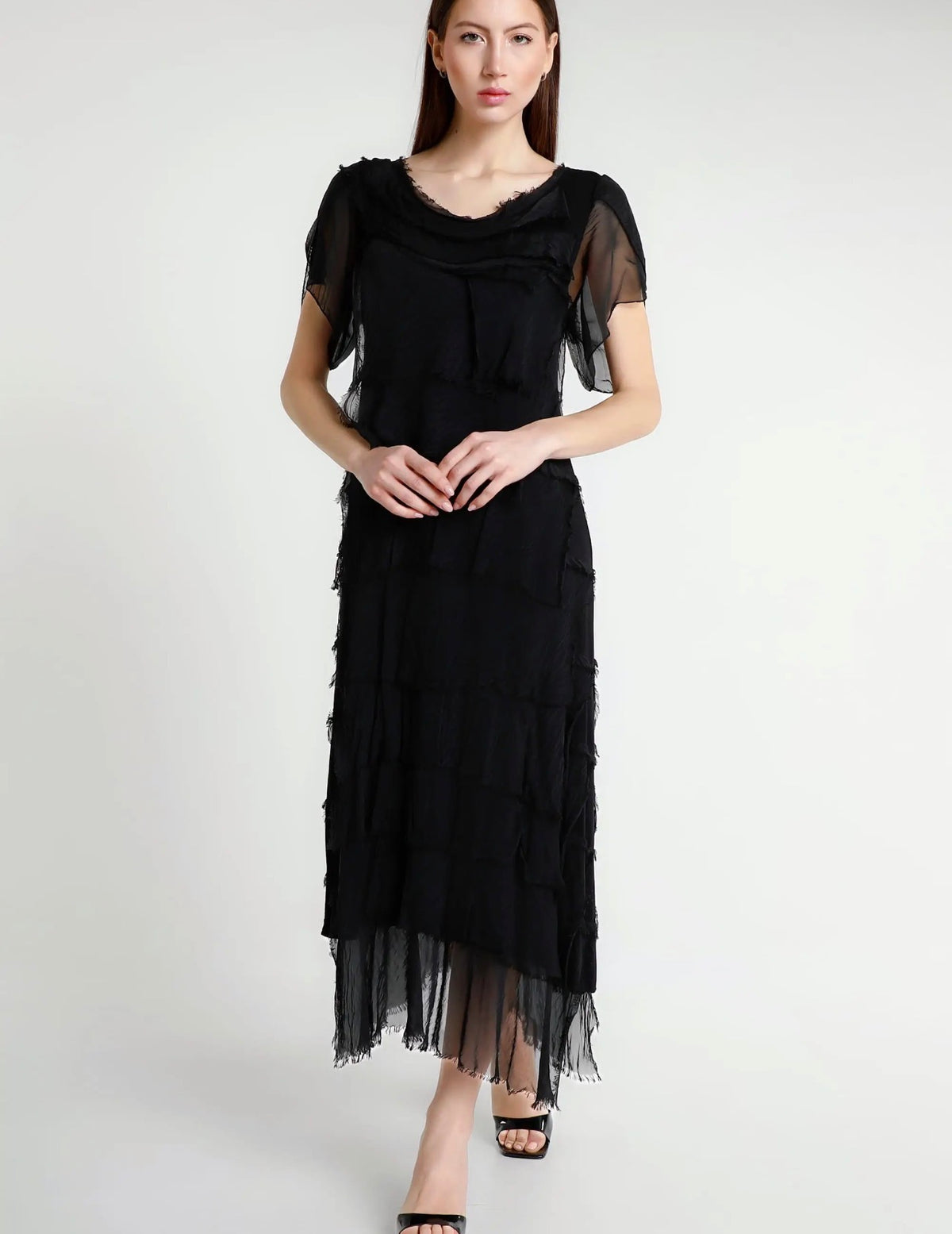 Black silk ruffle tiered short-sleeve dress with sheer ruffle sleeves, front view