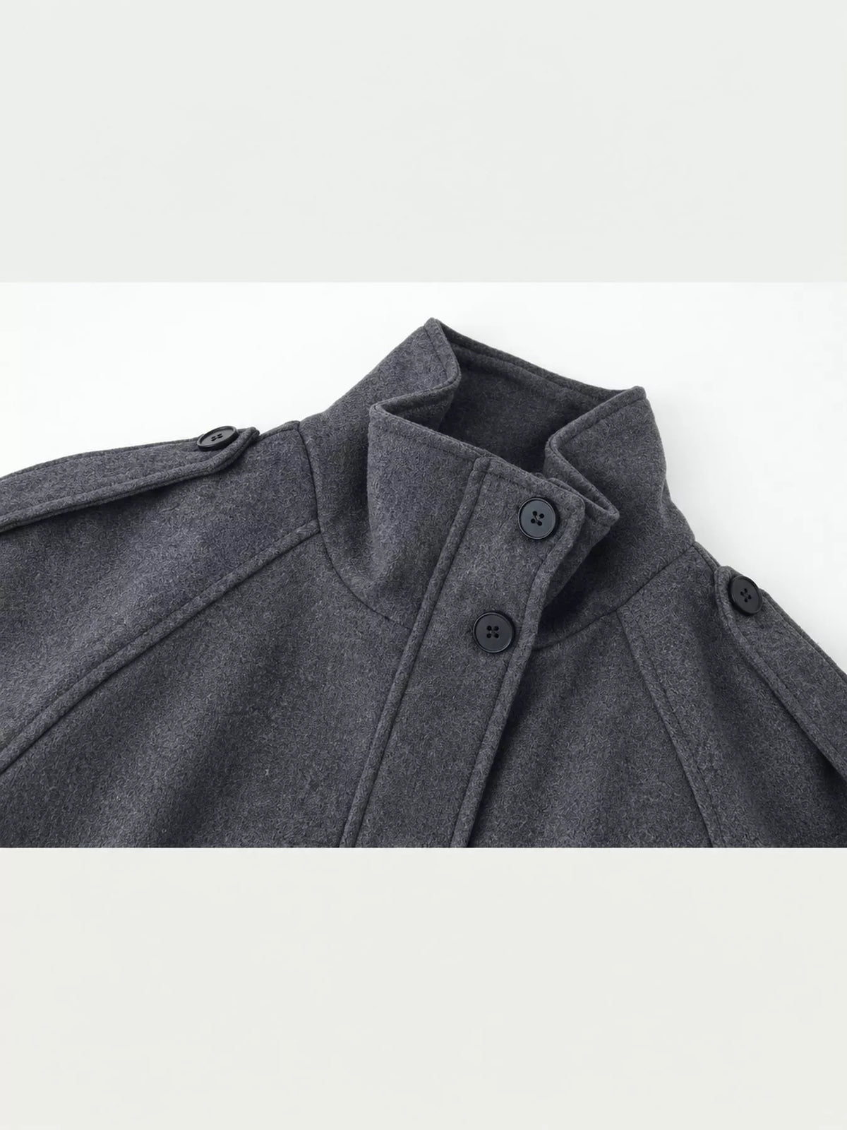 Gray stand-collar zip-up jacket with button placket and snap details