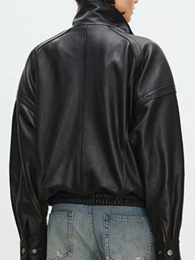 Black leather jacket with smooth leather back and ribbed hem, back view