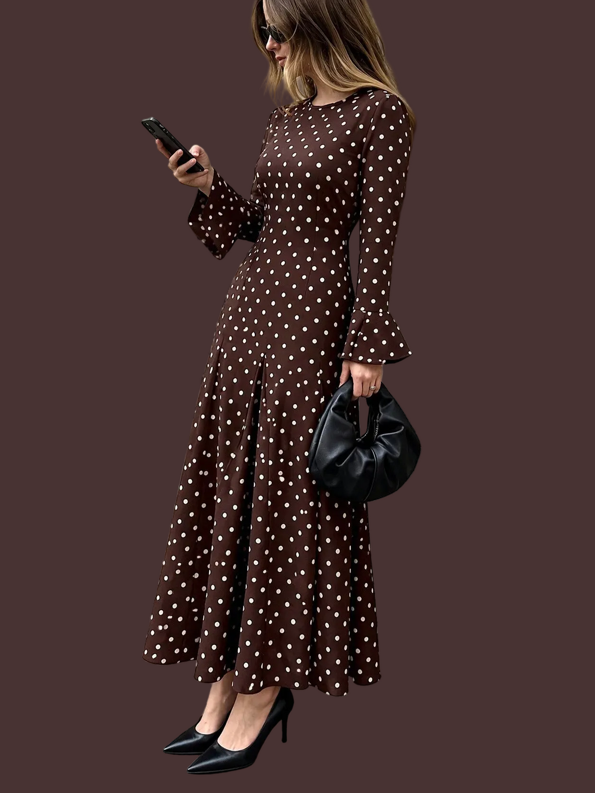 Coffee brown polka dot long sleeve maxi dress, back view with flared hem