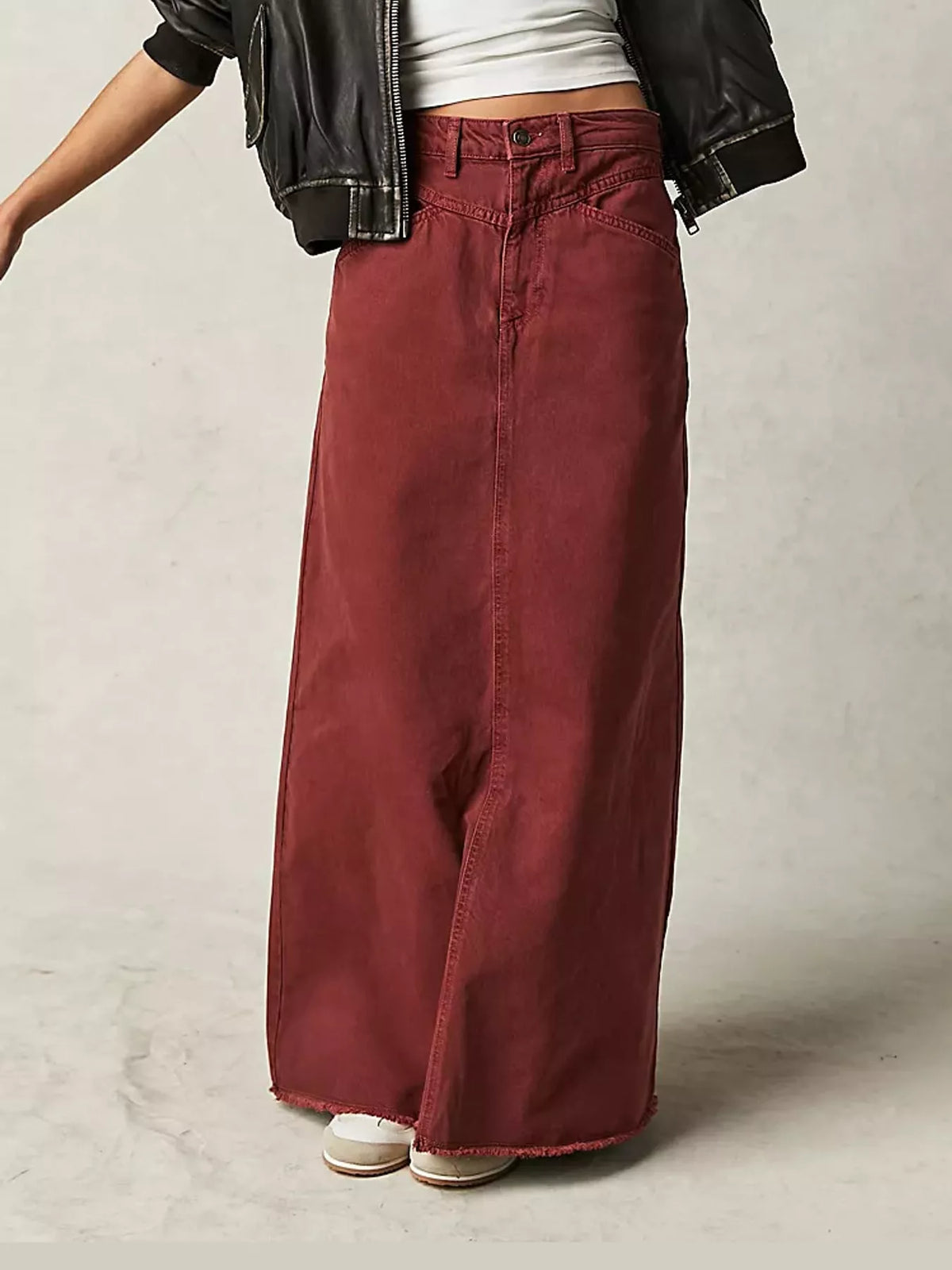 Burgundy maxi denim skirt with raw, frayed hem and metal button closure