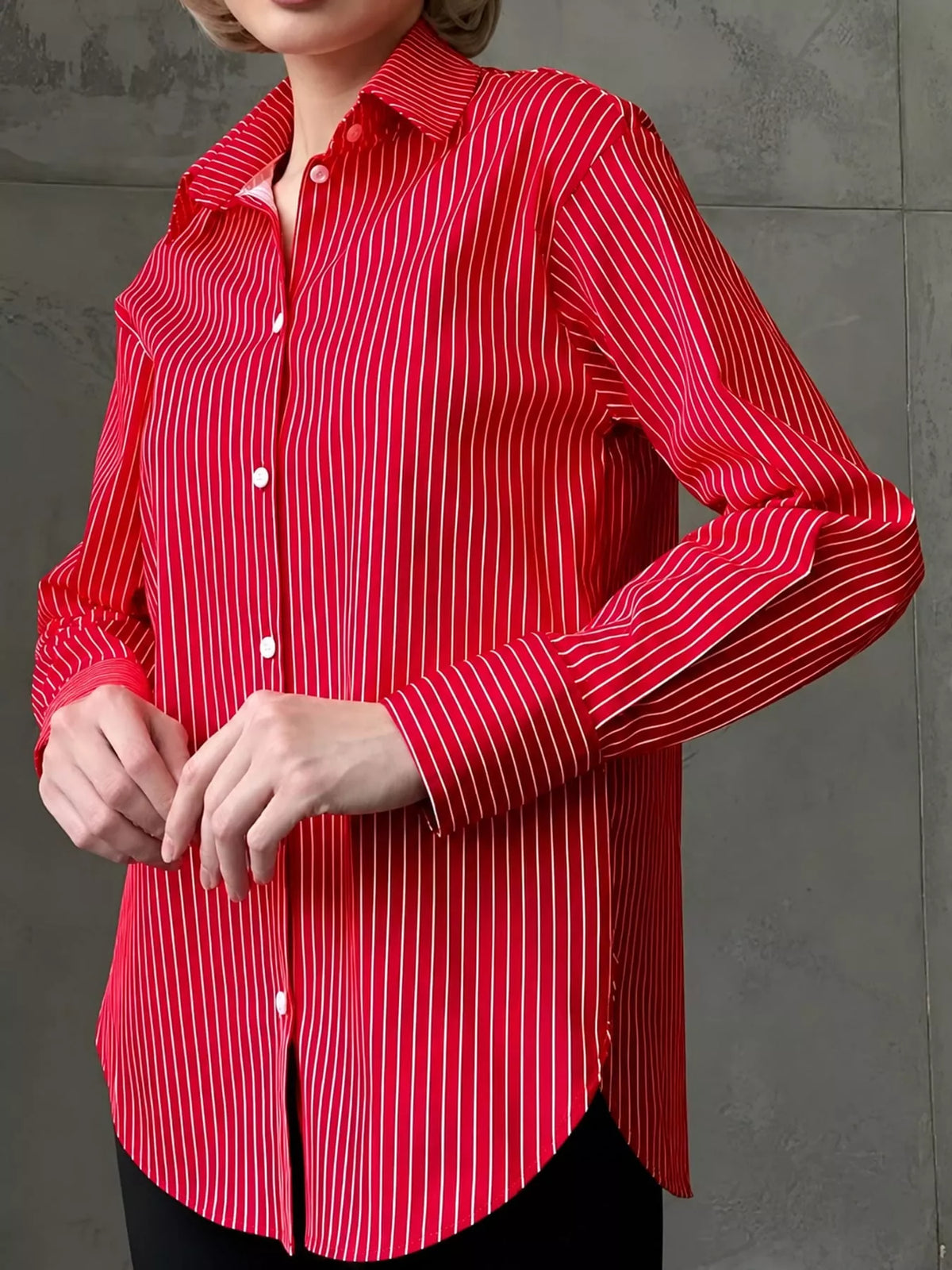 Red and white striped long-sleeve button-up shirt with pointed collar
