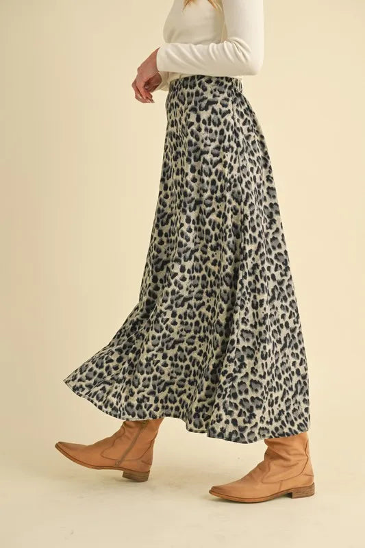 Aemi+Co leopard midi skirt in side view, with a flared hem