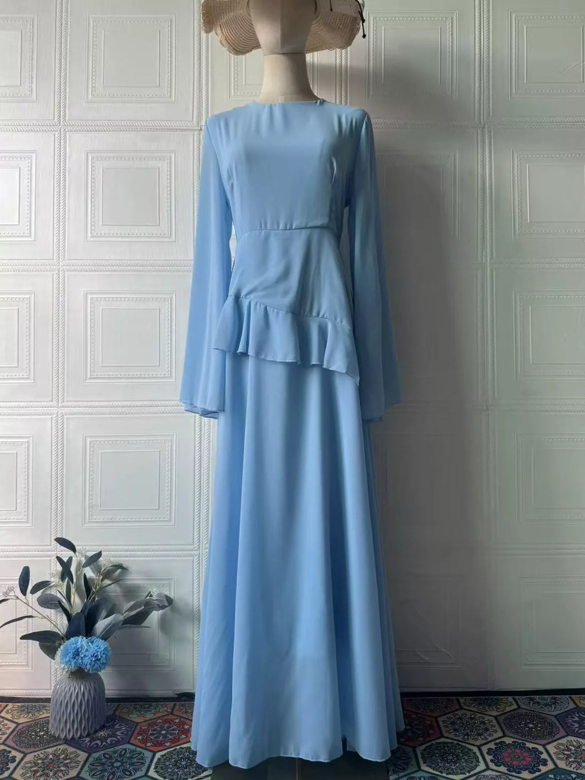 Light blue plus-size maxi dress with tiered ruffles and long sleeves, back view