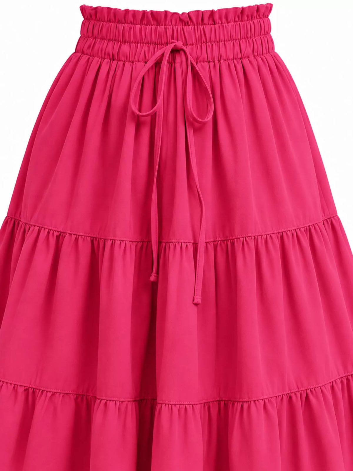 Hot pink tiered midi skirt close-up: elastic waistband with tie drawstring, ruffle tiers.