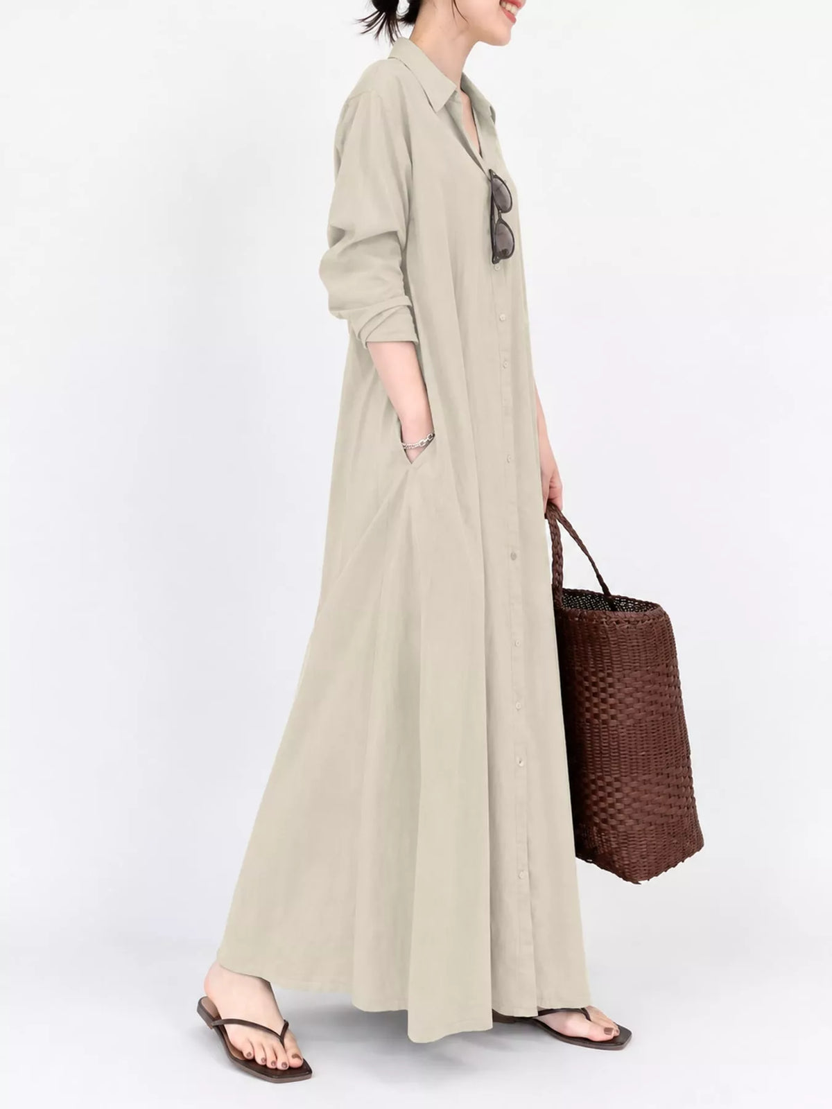 Light beige button-front long sleeve maxi shirt dress with relaxed fit and side pockets