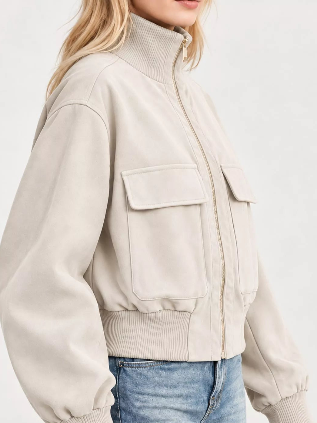 Front zip-up long-sleeve jacket in cream with chest flap pockets and ribbed collar