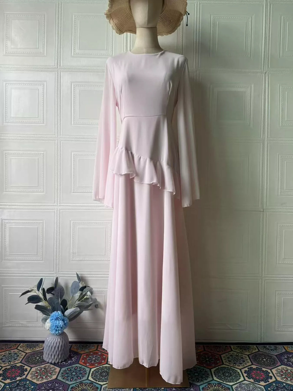 Light pink ruffled flare-sleeve maxi dress with tiered skirt and long sleeves
