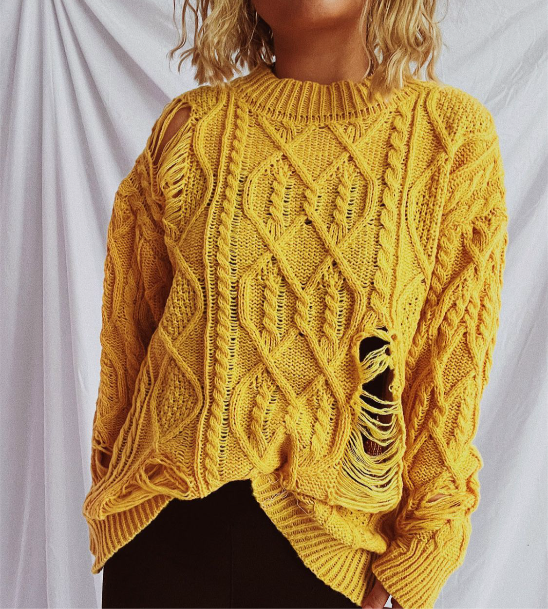 Distressed Cable-Knit Round Neck Long Sleeve Sweater