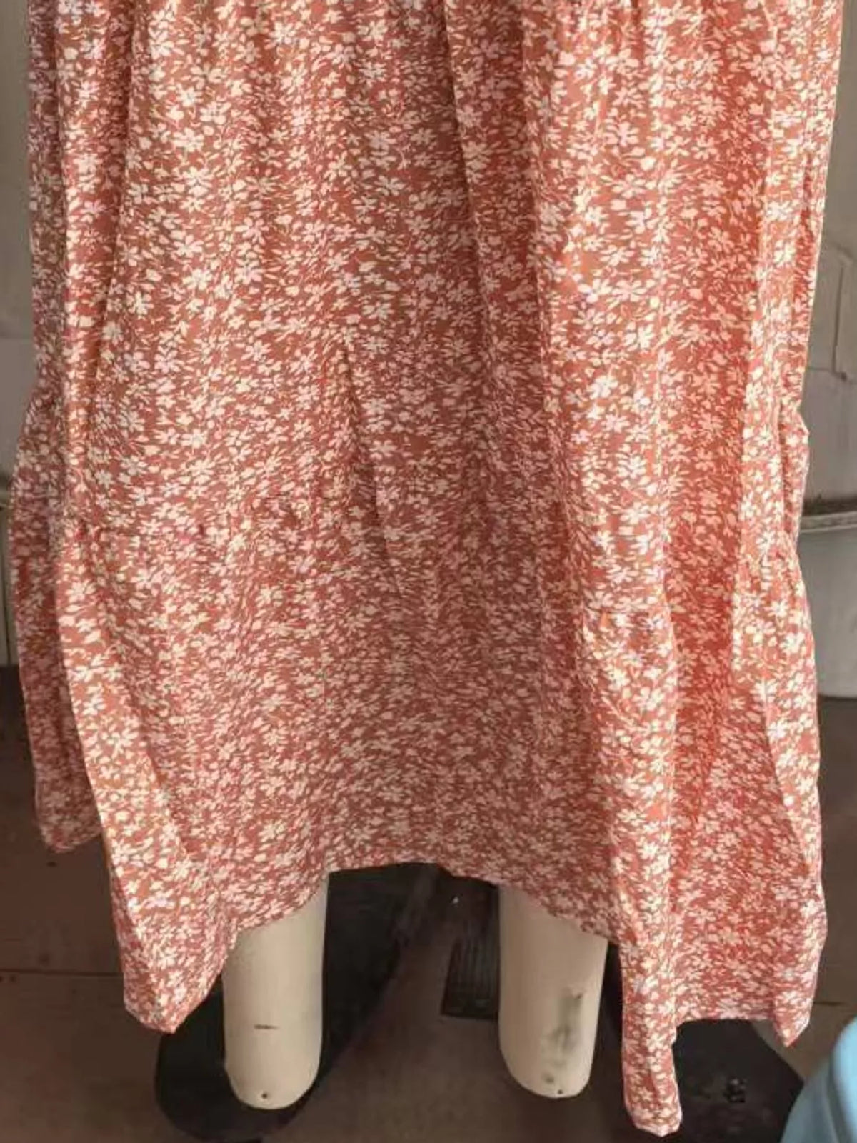 Floral tiered midi skirt in mauve and coral tones with gathered tiers and elastic waist