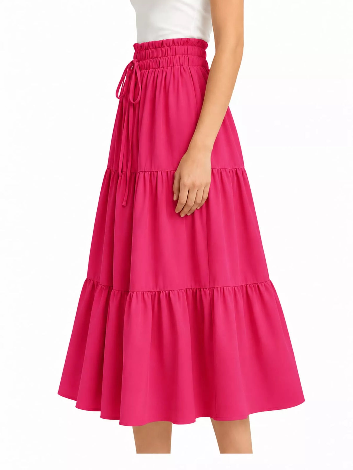 Hot pink tiered midi skirt with elastic waistband and bow tie, tiered ruffle layers.