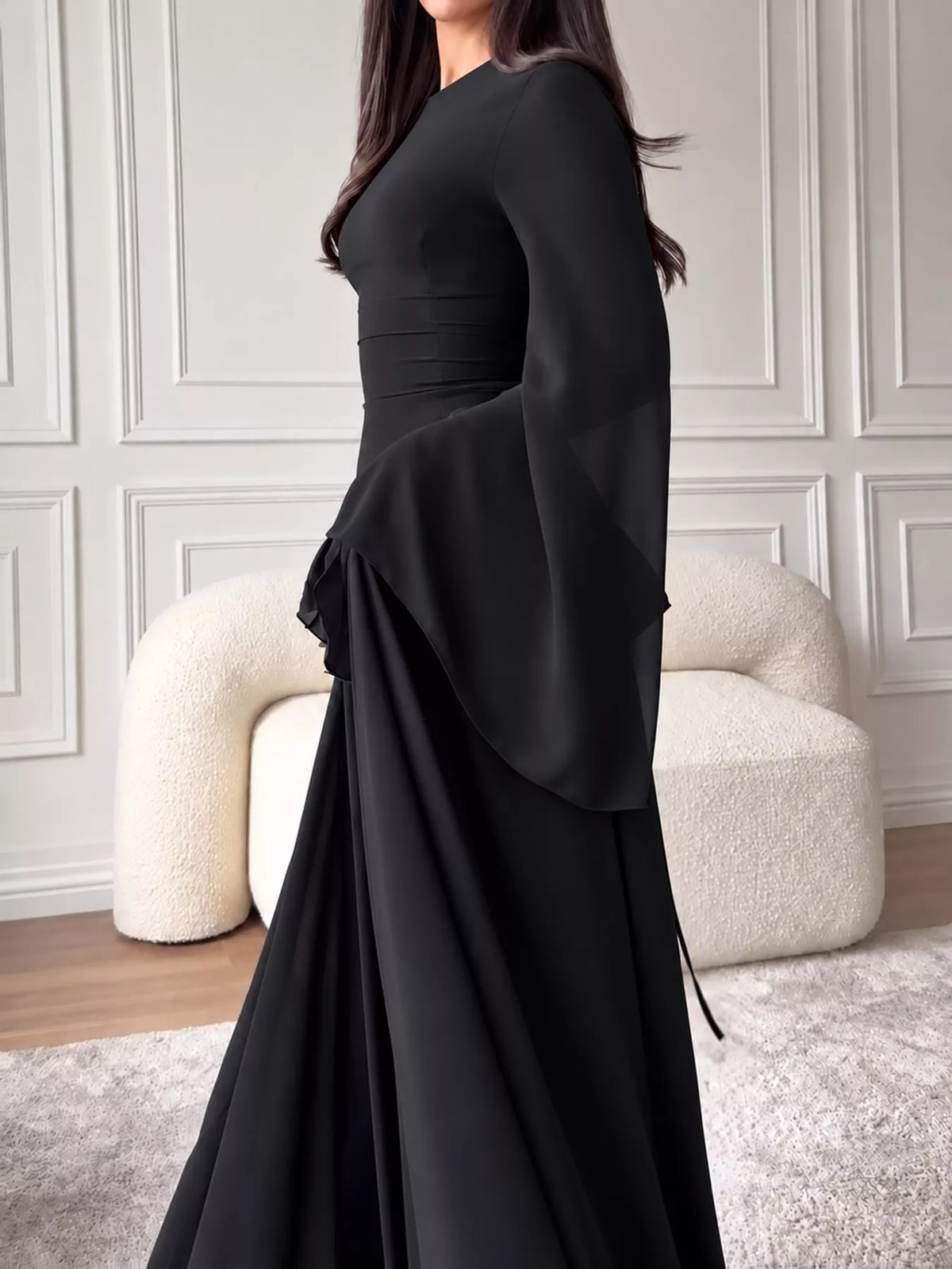 Plus size ruffled flare sleeve maxi dress in black, side view with ruffled skirt layers