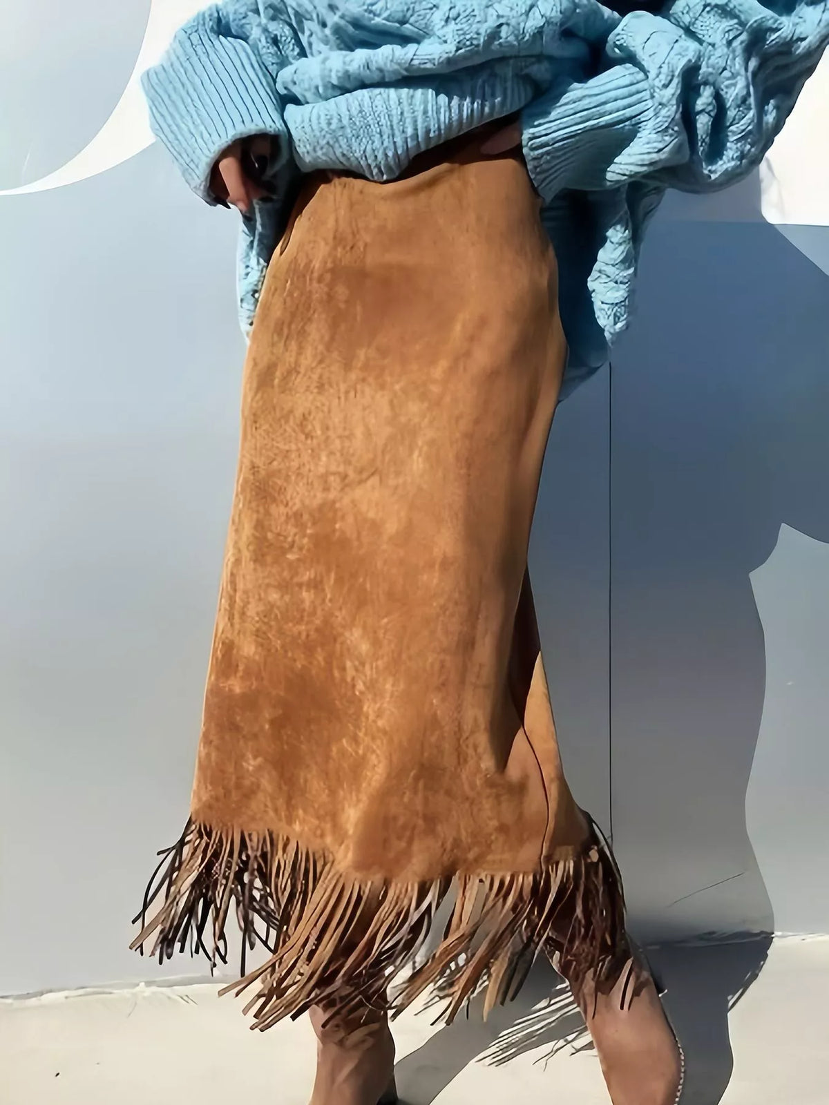 Light brown suede high-waisted midi skirt with fringe at hem