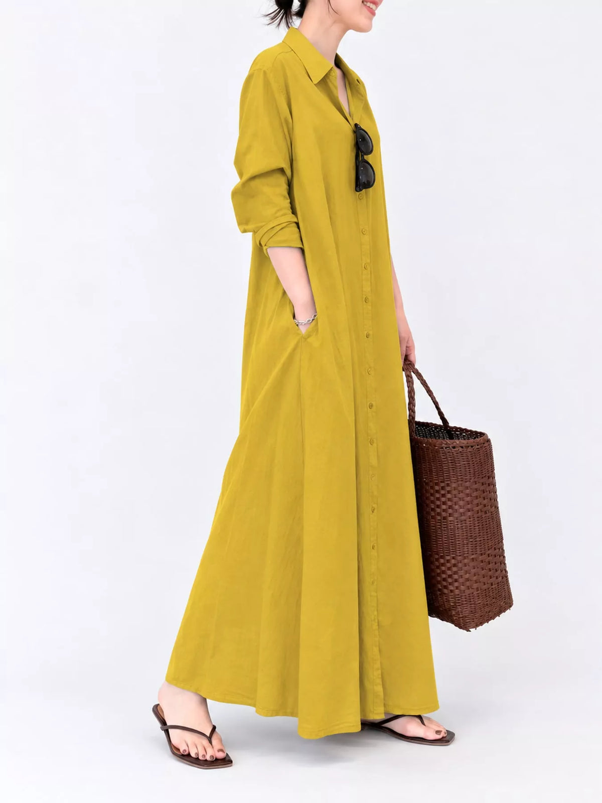 Mustard yellow long sleeve button-front maxi shirt dress with pleated skirt