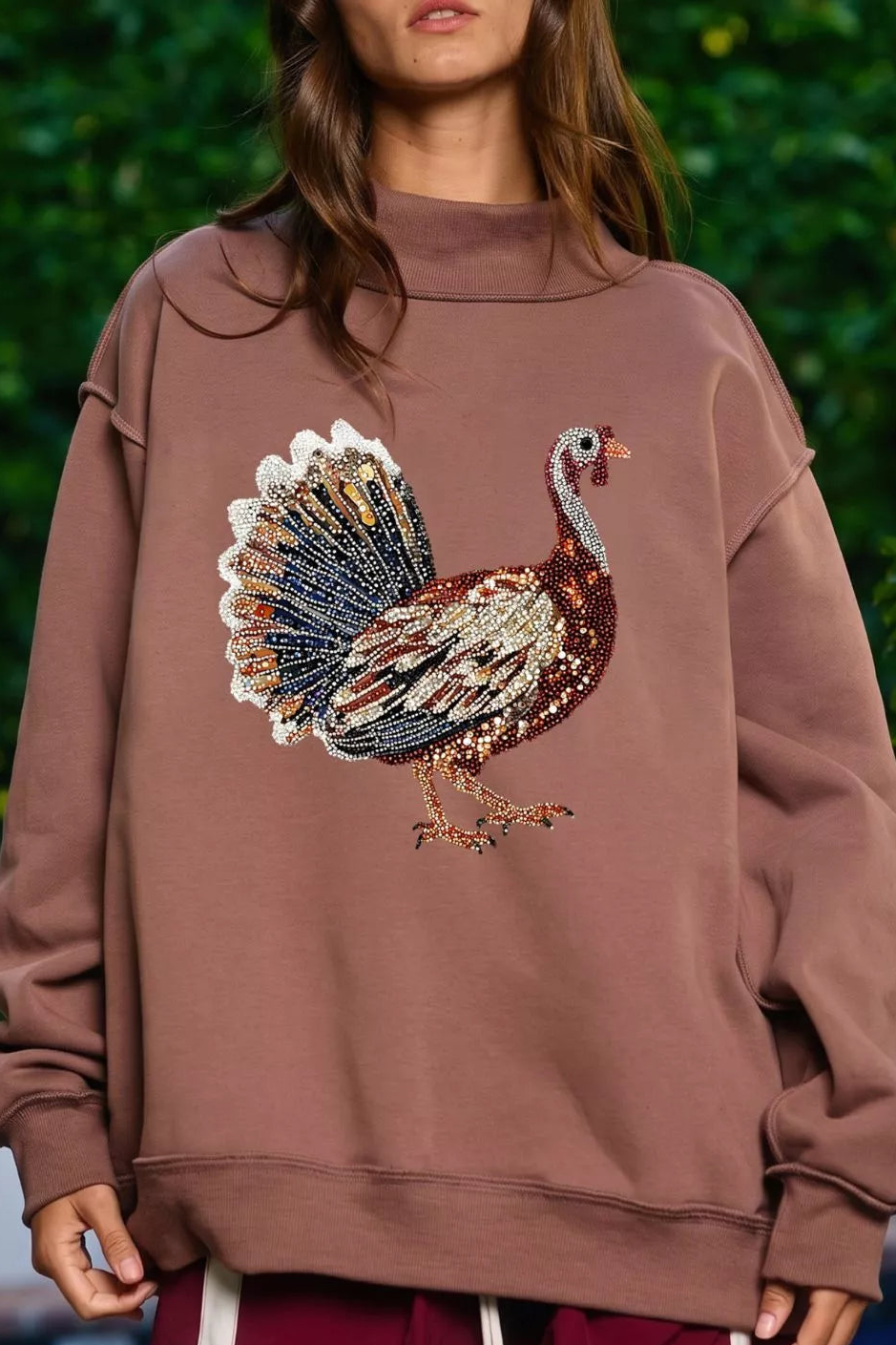 Dark brown high-neck sweatshirt with sequin turkey graphic