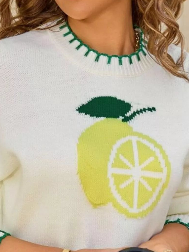 Cream knit sweater with lemon slice front graphic and green/yellow contrast trim
