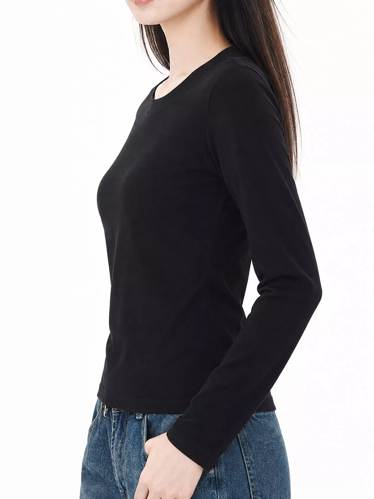 Black long sleeve crew neck T-shirt with fitted sleeves and smooth neckline.