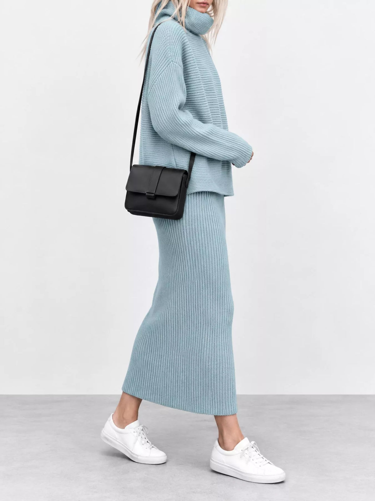 Light blue ribbed sweater and midi skirt set, shown from the side