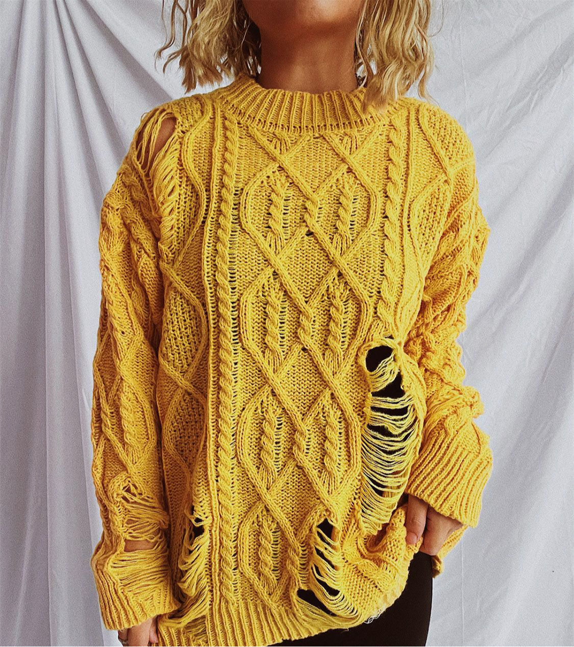 Distressed Cable-Knit Round Neck Long Sleeve Sweater