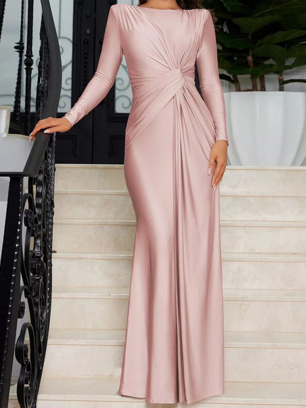 Pink twisted long-sleeve maxi dress with ruched knot detail at the back