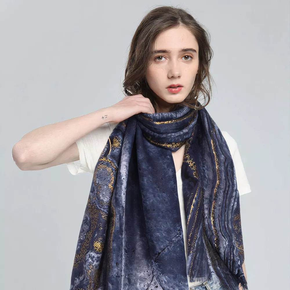 Navy marble print foil scarf worn around neck
