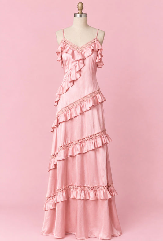 Pink satin maxi dress on mannequin with tiered ruffle lace trim and spaghetti straps