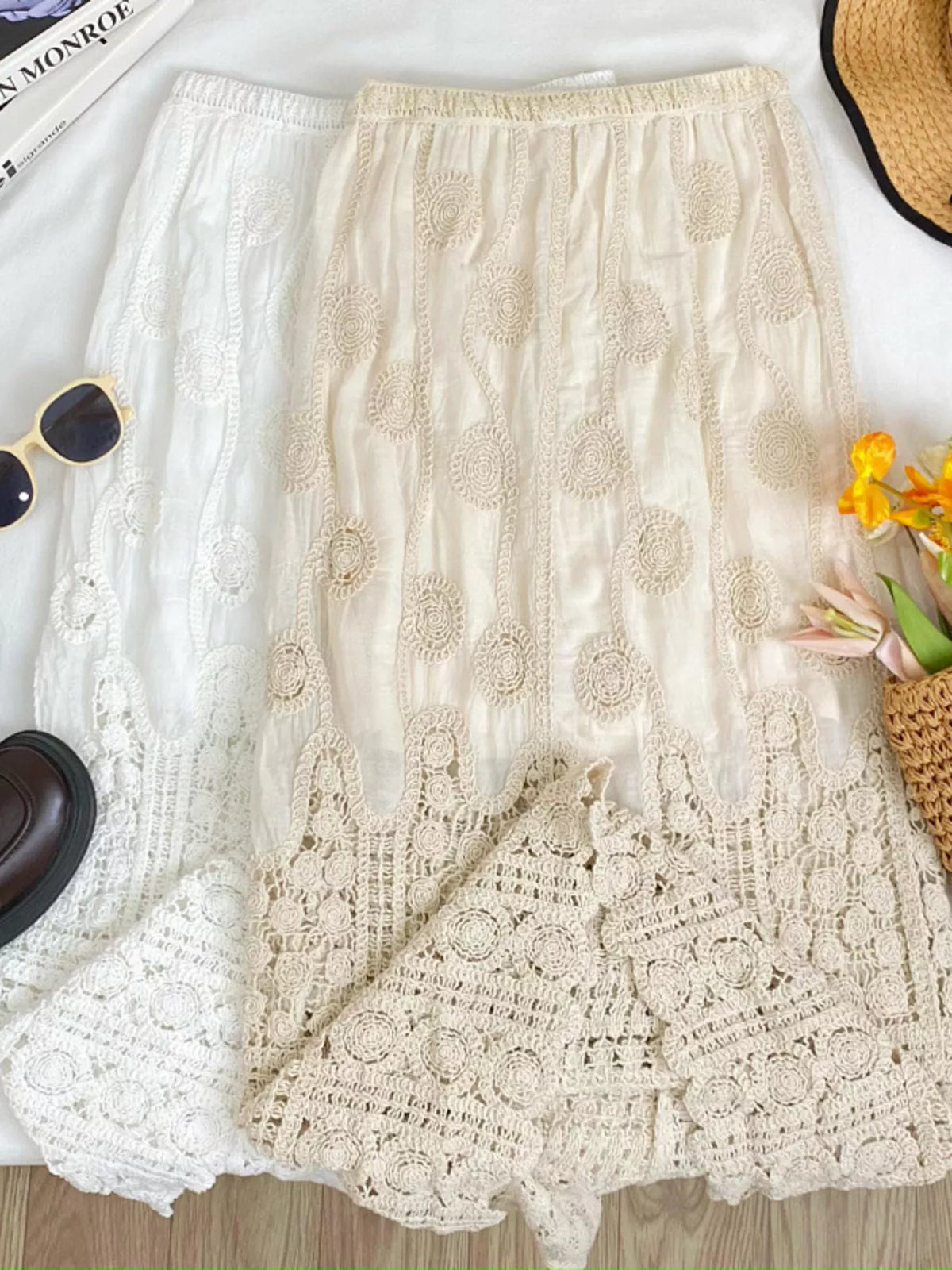 Lace midi skirt with elastic waist, floral motifs, and a wide crochet hem in white and apricot