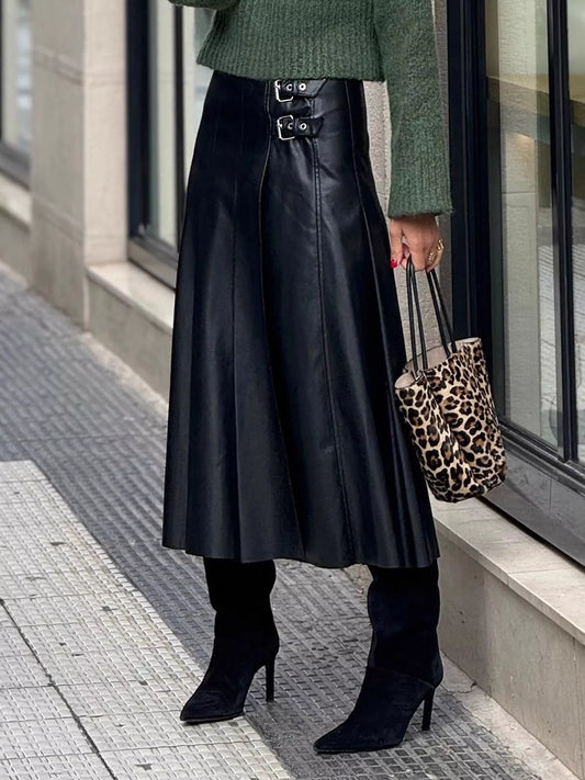 Black faux leather midi skirt with buckle straps at waistband, A-line fit