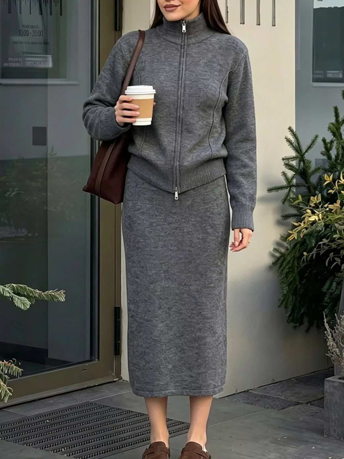 Dark gray cardigan and midi skirt set, shown with the cardigan zipped to the neck