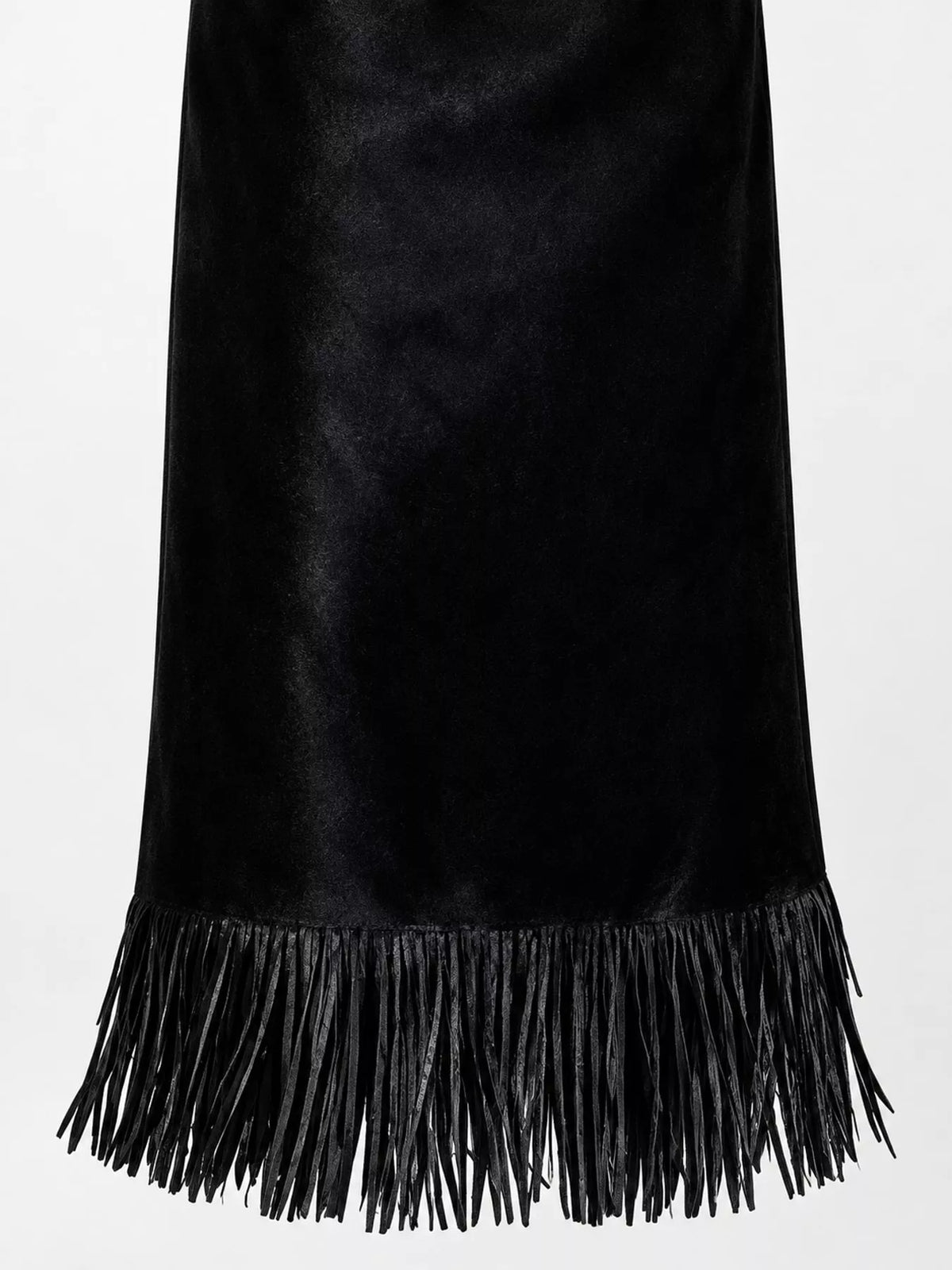 Close-up of black midi skirt fabric and long fringe trim