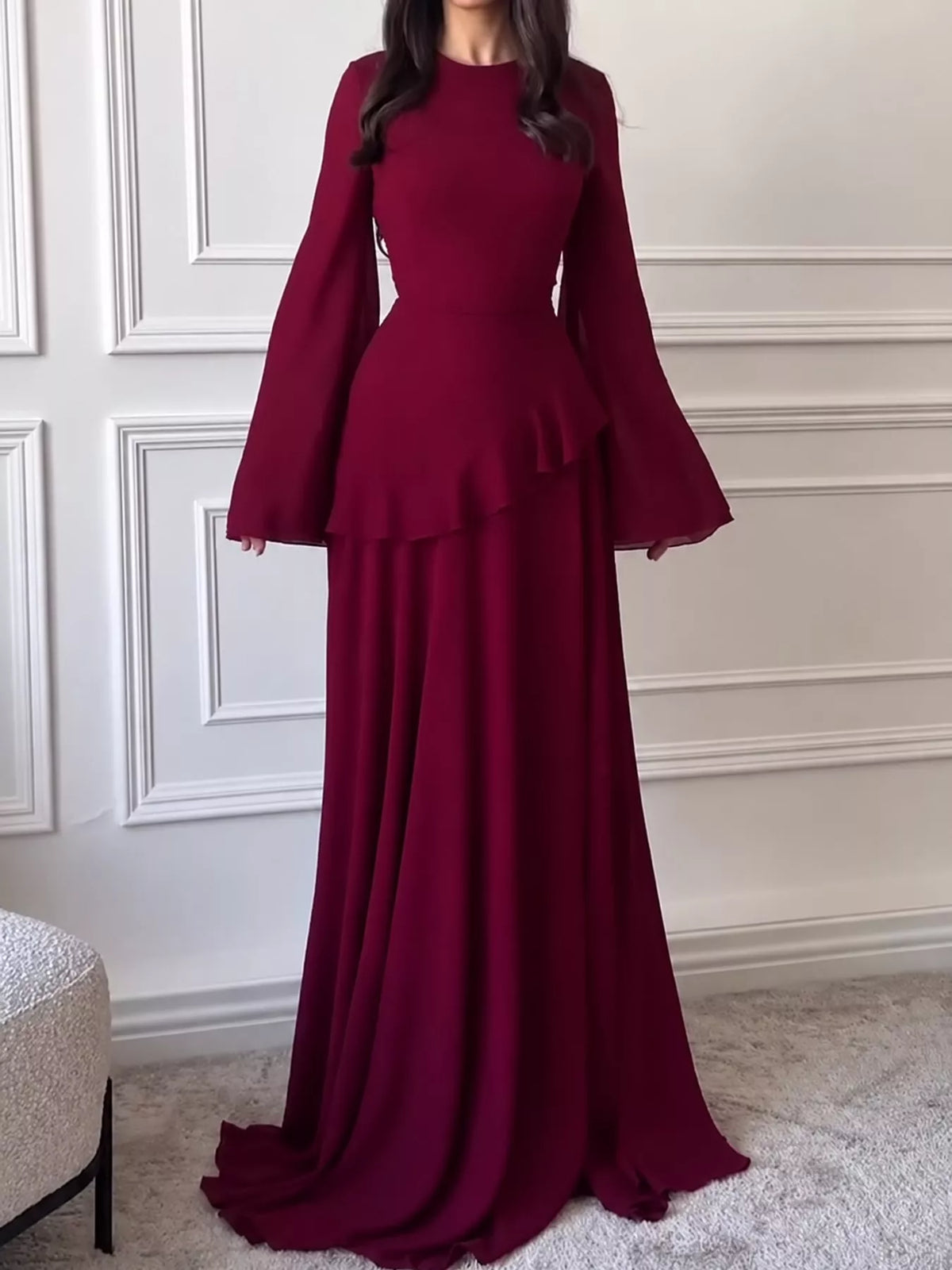 Burgundy plus-size maxi dress with ruffled flare sleeves and layered skirt