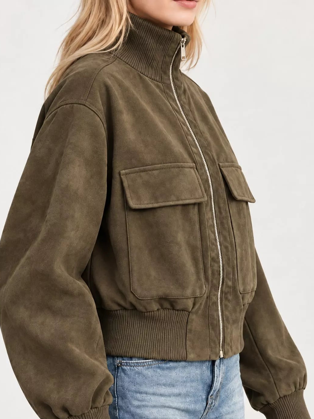 Olive-brown zip-up jacket with ribbed mock neck, front zipper, and chest patch pocket flaps