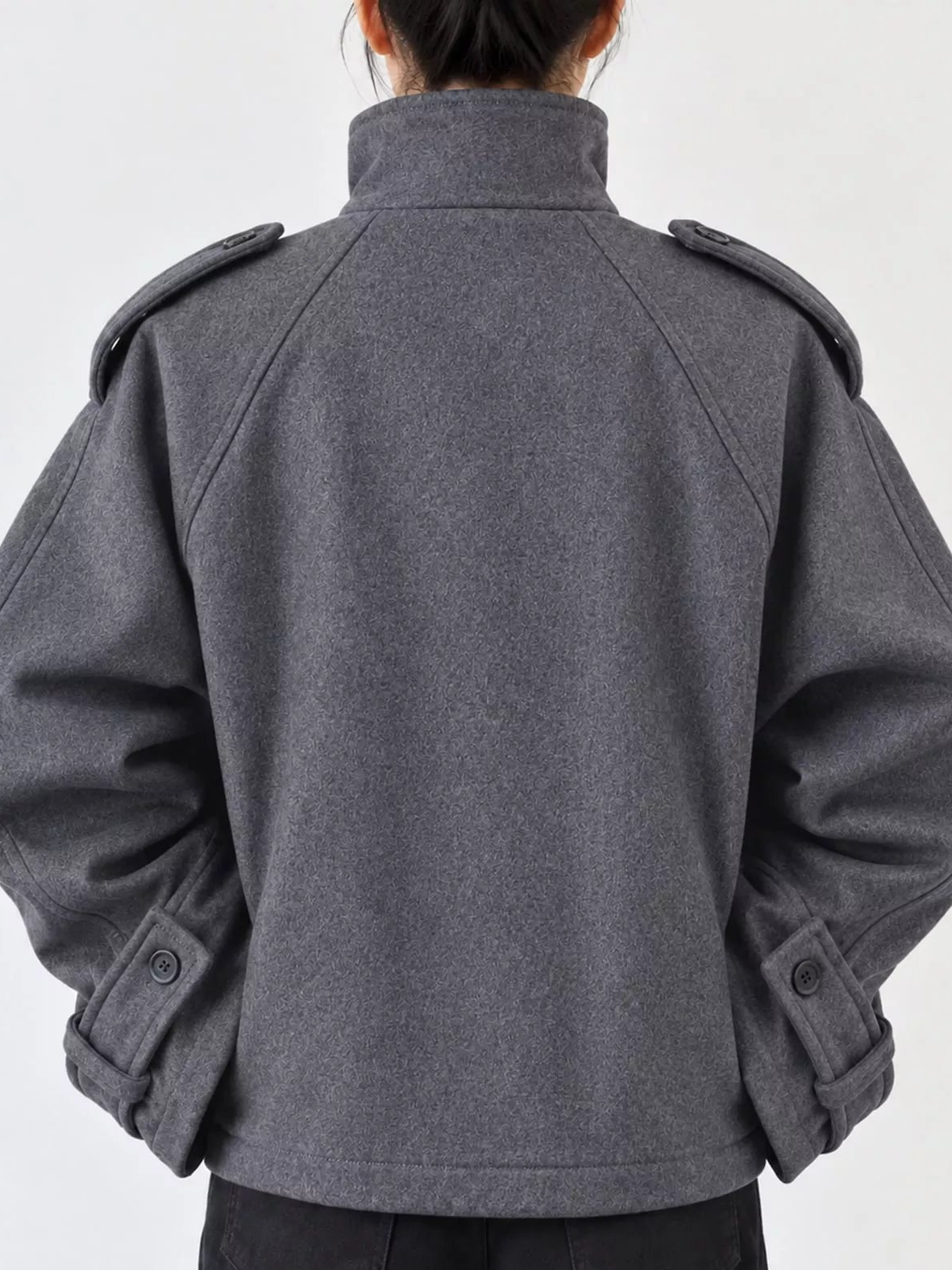 Heather gray stand-collar zip-up jacket, back view with shoulder tabs and snap cuffs.