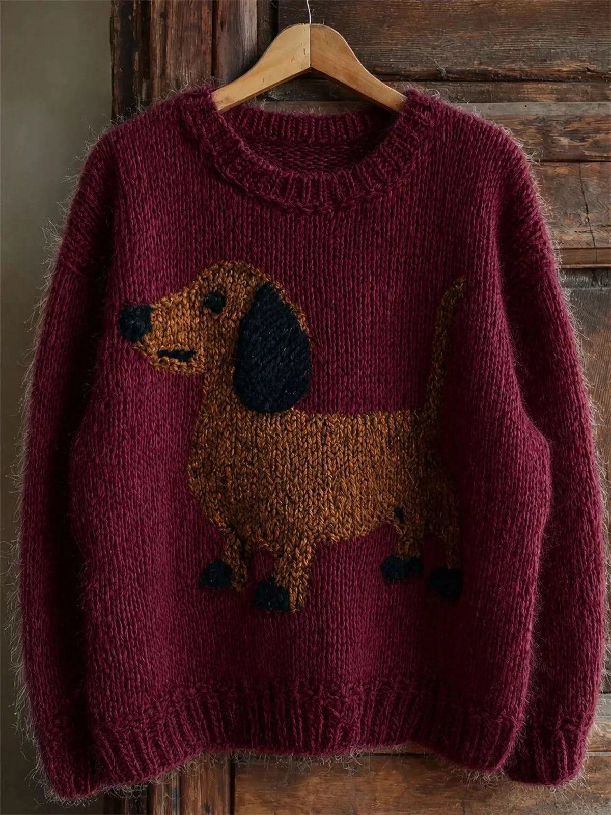 Burgundy dropped-shoulder knit sweater with dachshund intarsia front