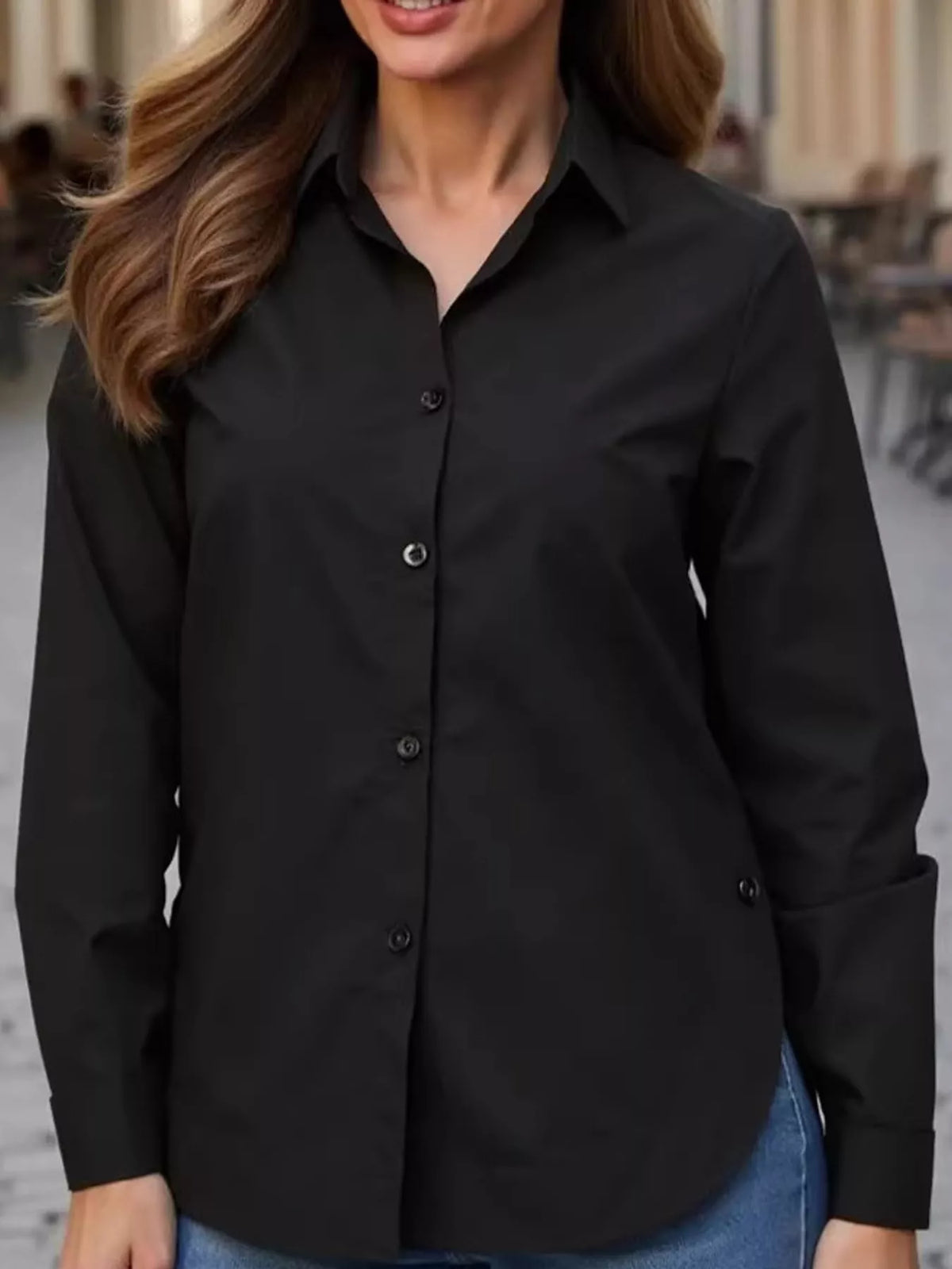 Black button-up long sleeve shirt with point collar and front buttons