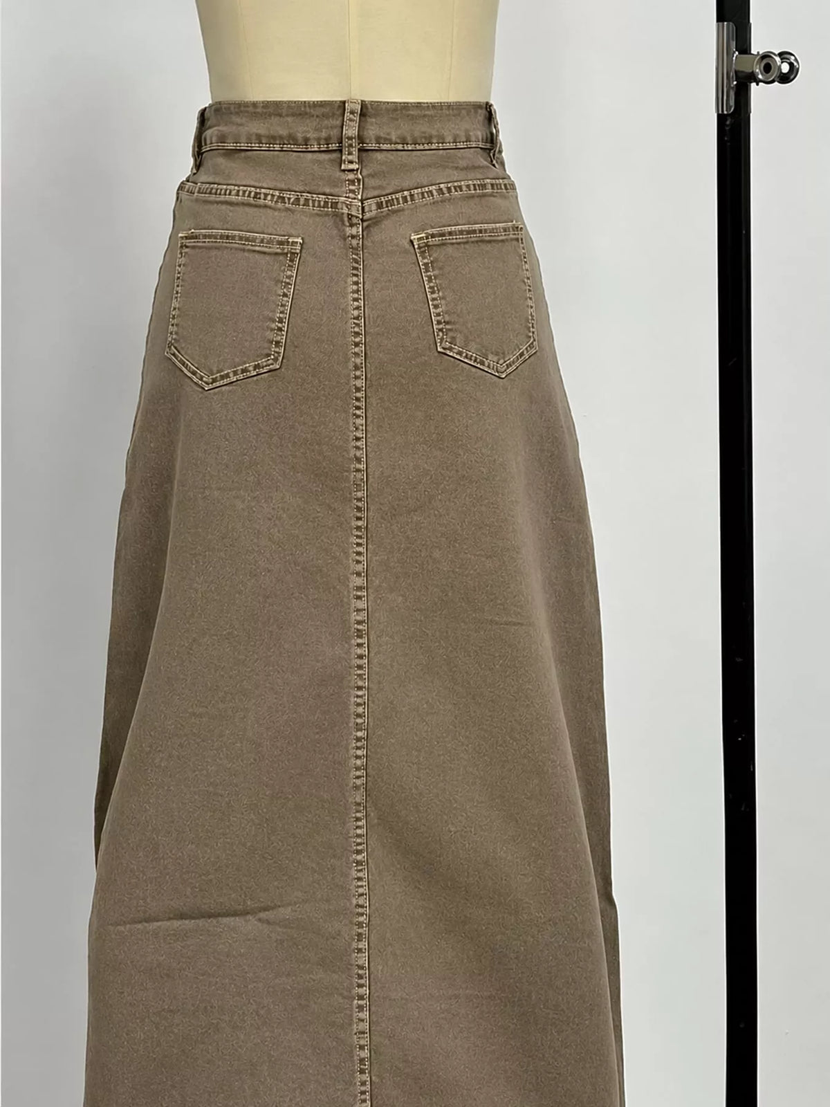Coffee-brown maxi denim skirt with button fly and front patch pockets