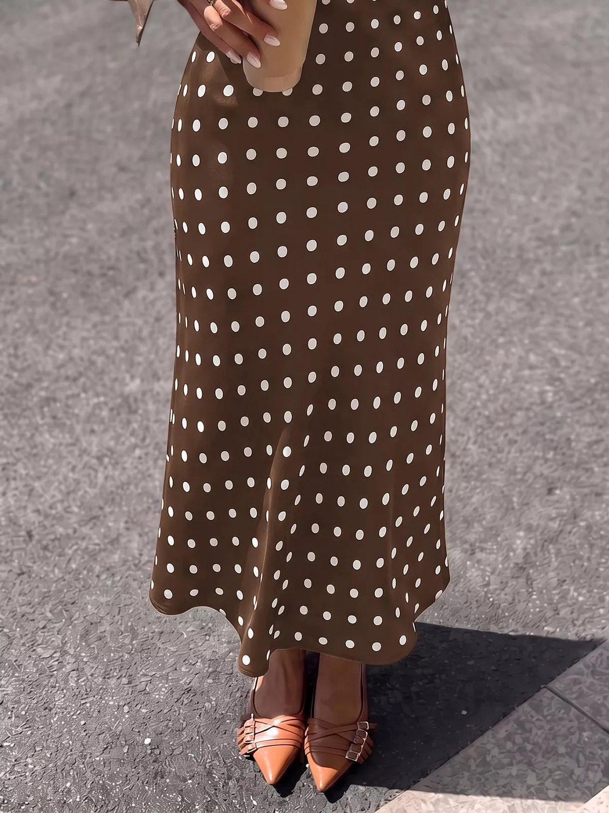 Brown polka-dot midi skirt with allover white dot pattern