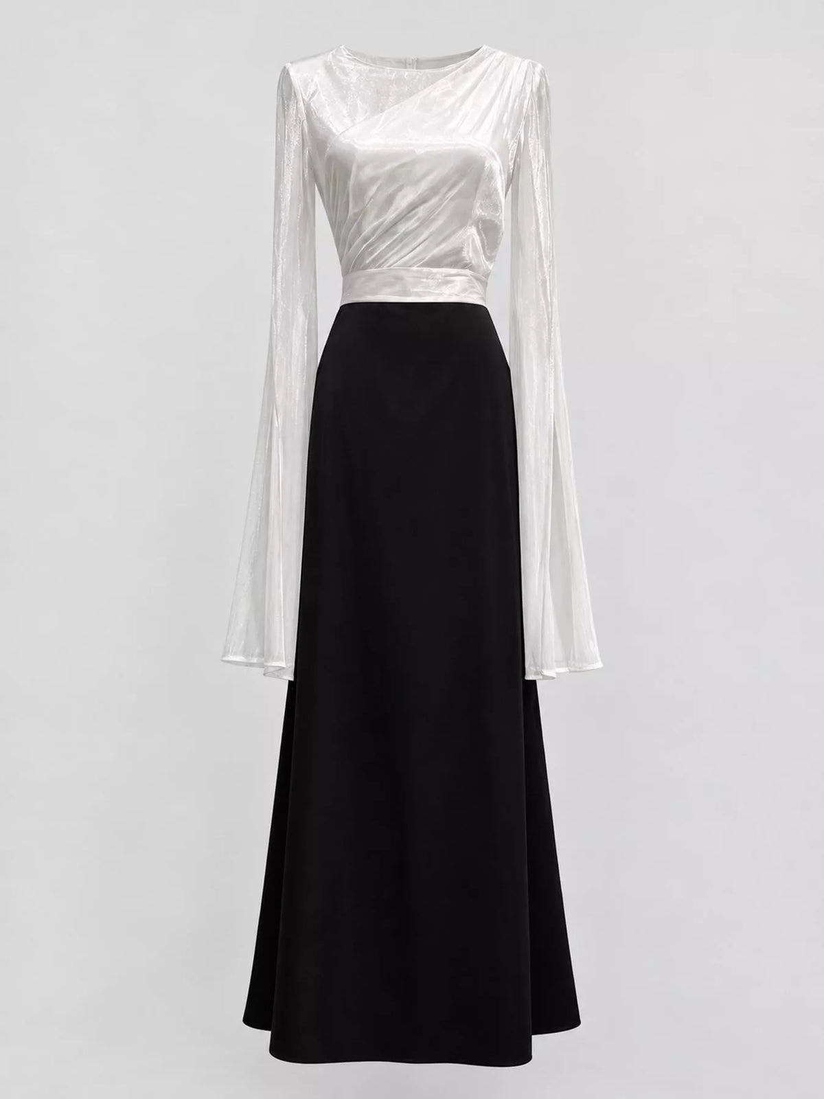 Colorblock maxi dress with a white ruched top, black skirt and long sheer sleeves