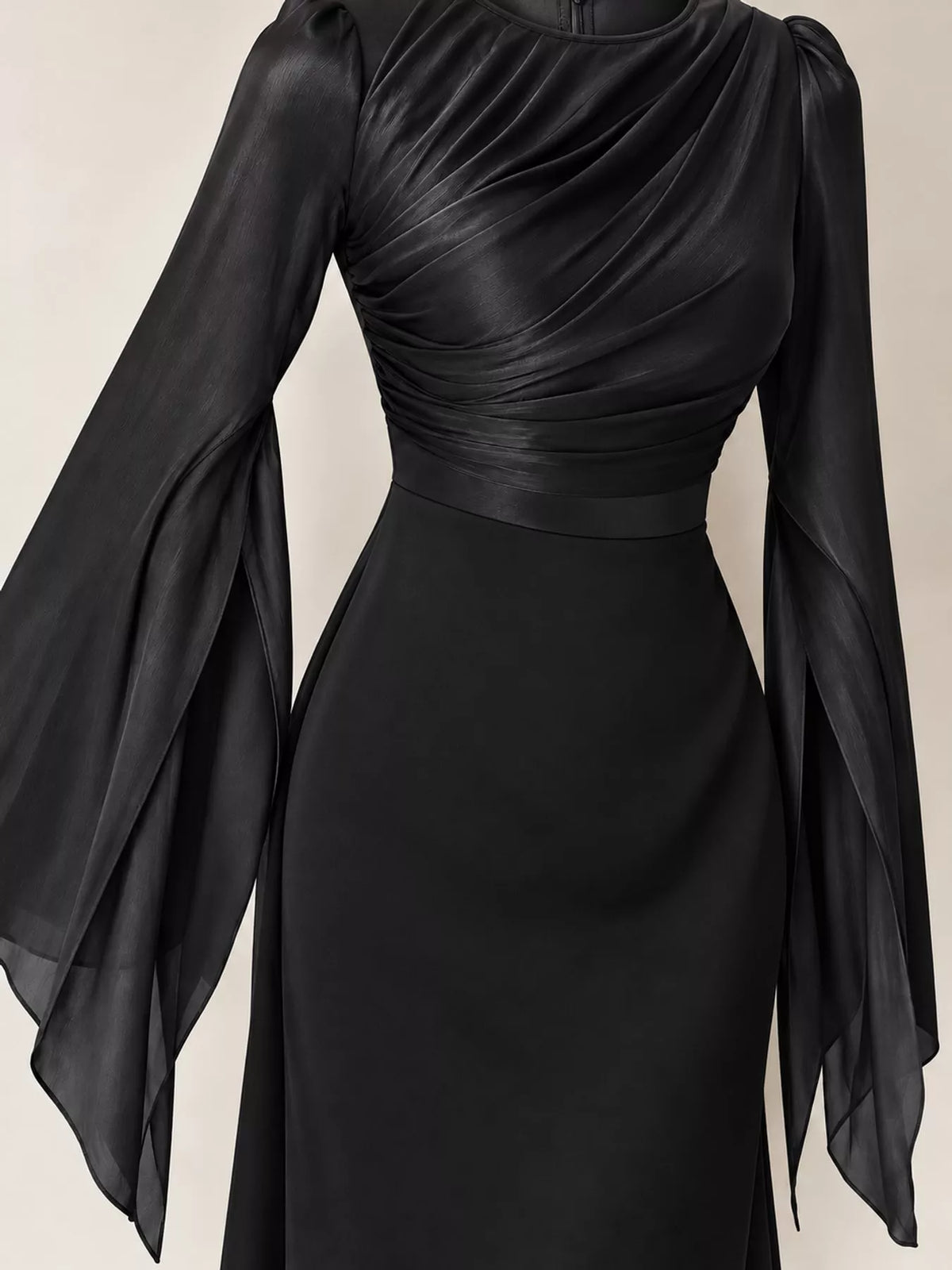 Black maxi dress with a ruched bodice, fitted waist and sheer flared sleeves