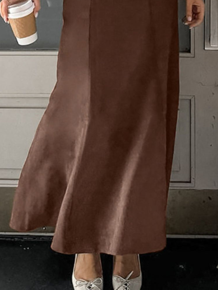 Dark brown suede midi skirt with a softly flared hem