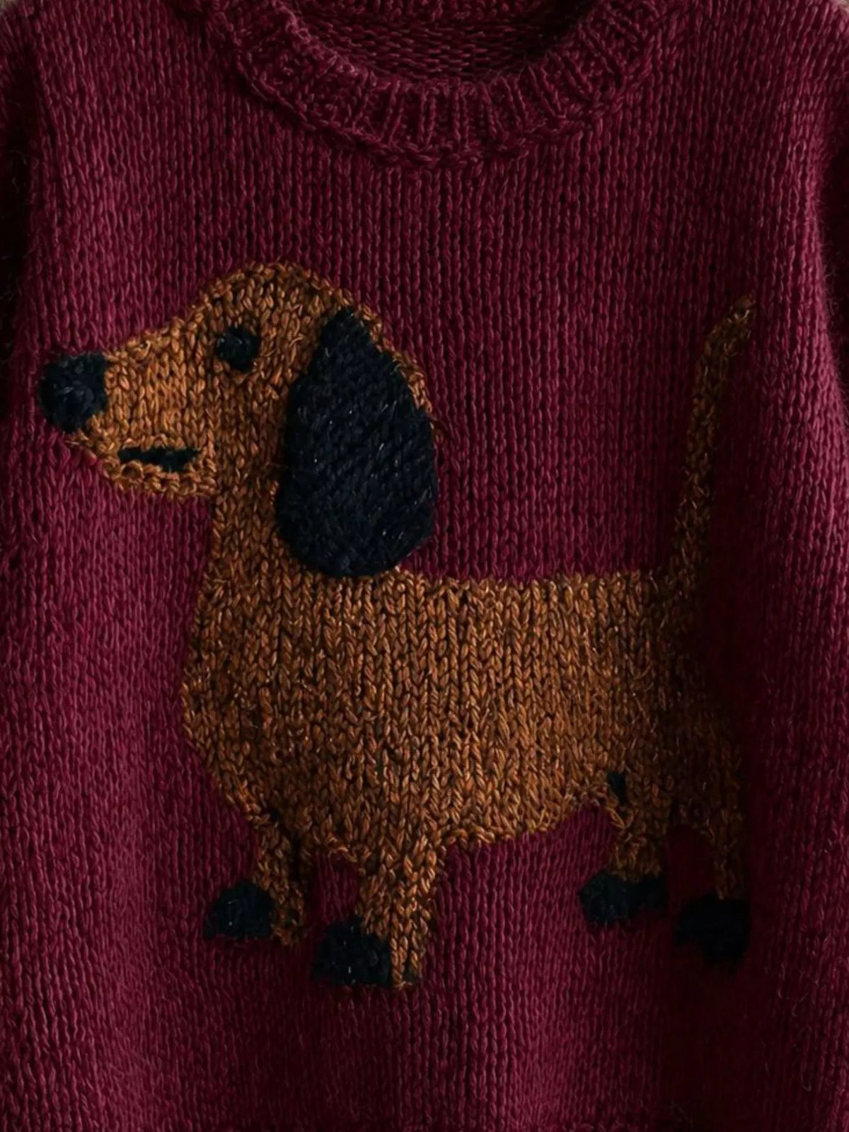 Burgundy dropped-shoulder knit sweater with dachshund intarsia front detail